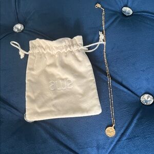 Awe Harriet Tubman Gold Pendant Necklace with White Pouch